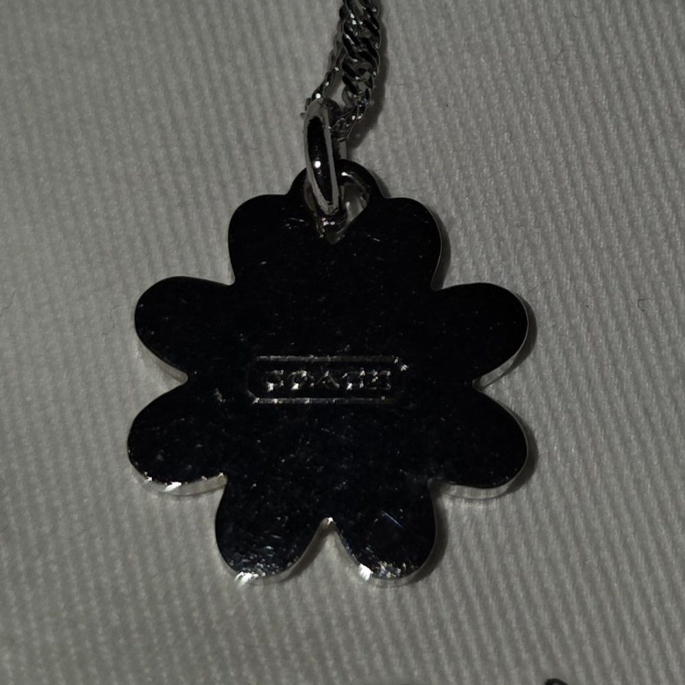 COACH Silver And Orange Daisy Pendant Necklace - Picture 4 of 6